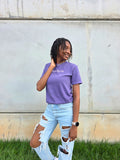 Manifest That Bag t-shirt in grape – front view Model posing looking off in the left direction