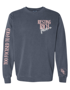 Resting Rich Face sweatshirt in denim Peach color writing – front view