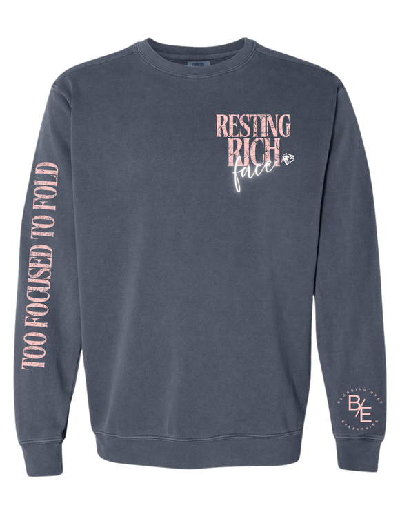 Resting Rich Face sweatshirt in denim Peach color writing – front view
